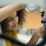 Children using the hand robot technology,